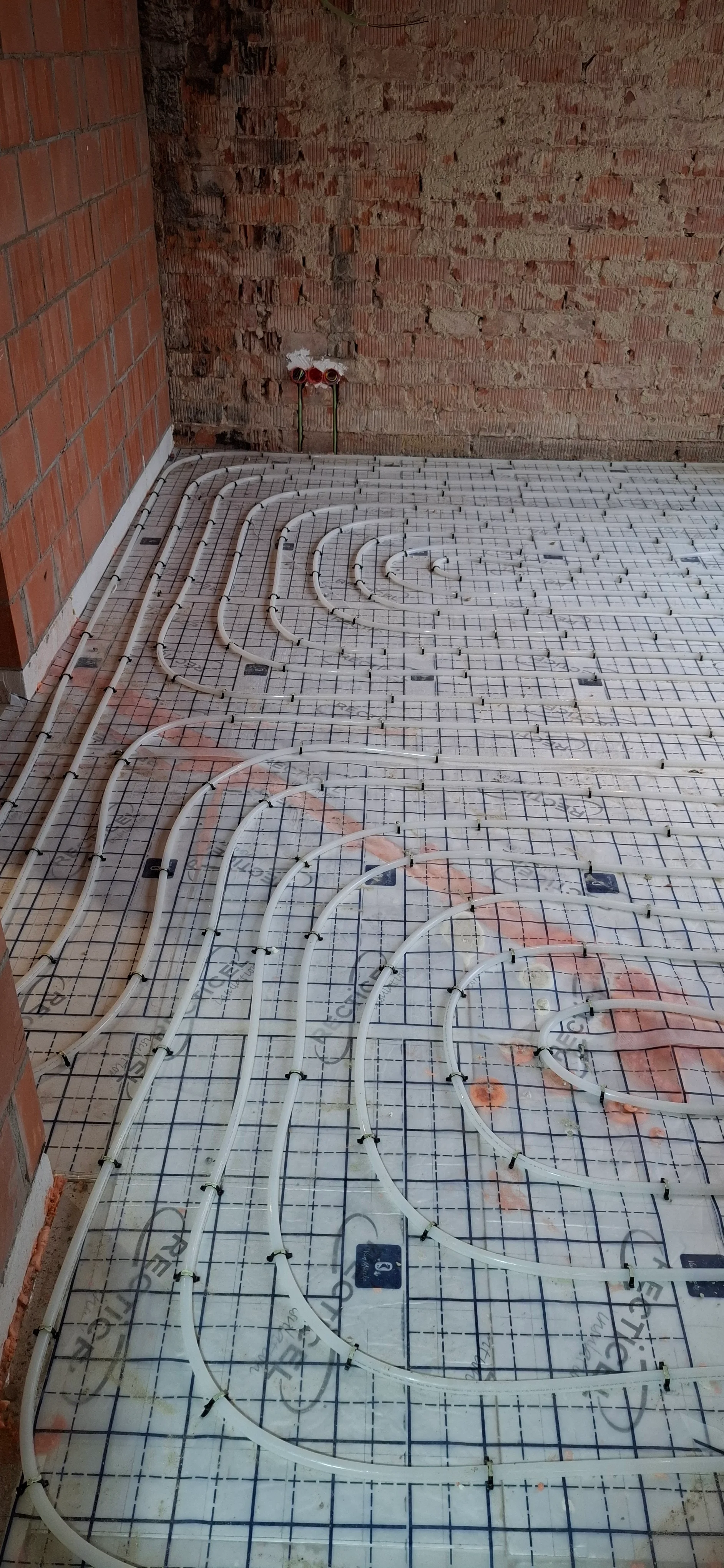 Vloerverwarming installatie in aanbouw